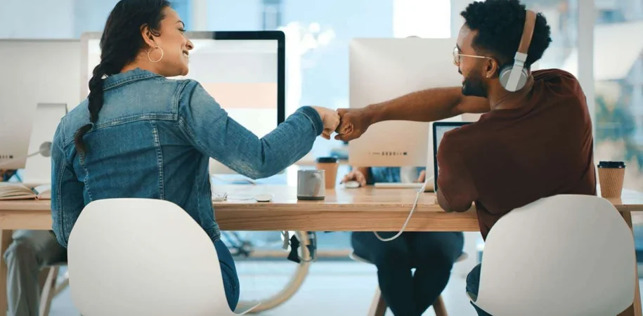 Business professionals discussing recruitment strategies in a modern office
