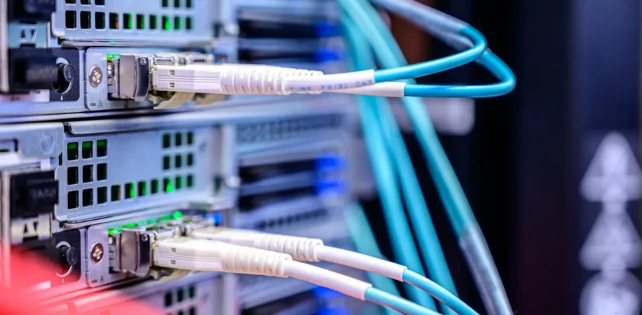 Connected servers and network cables representing managed IT infrastructure
