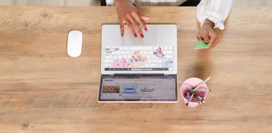 Woman shopping on an eCommerce website viewed from above